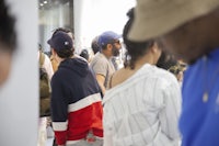 a group of people standing in a line